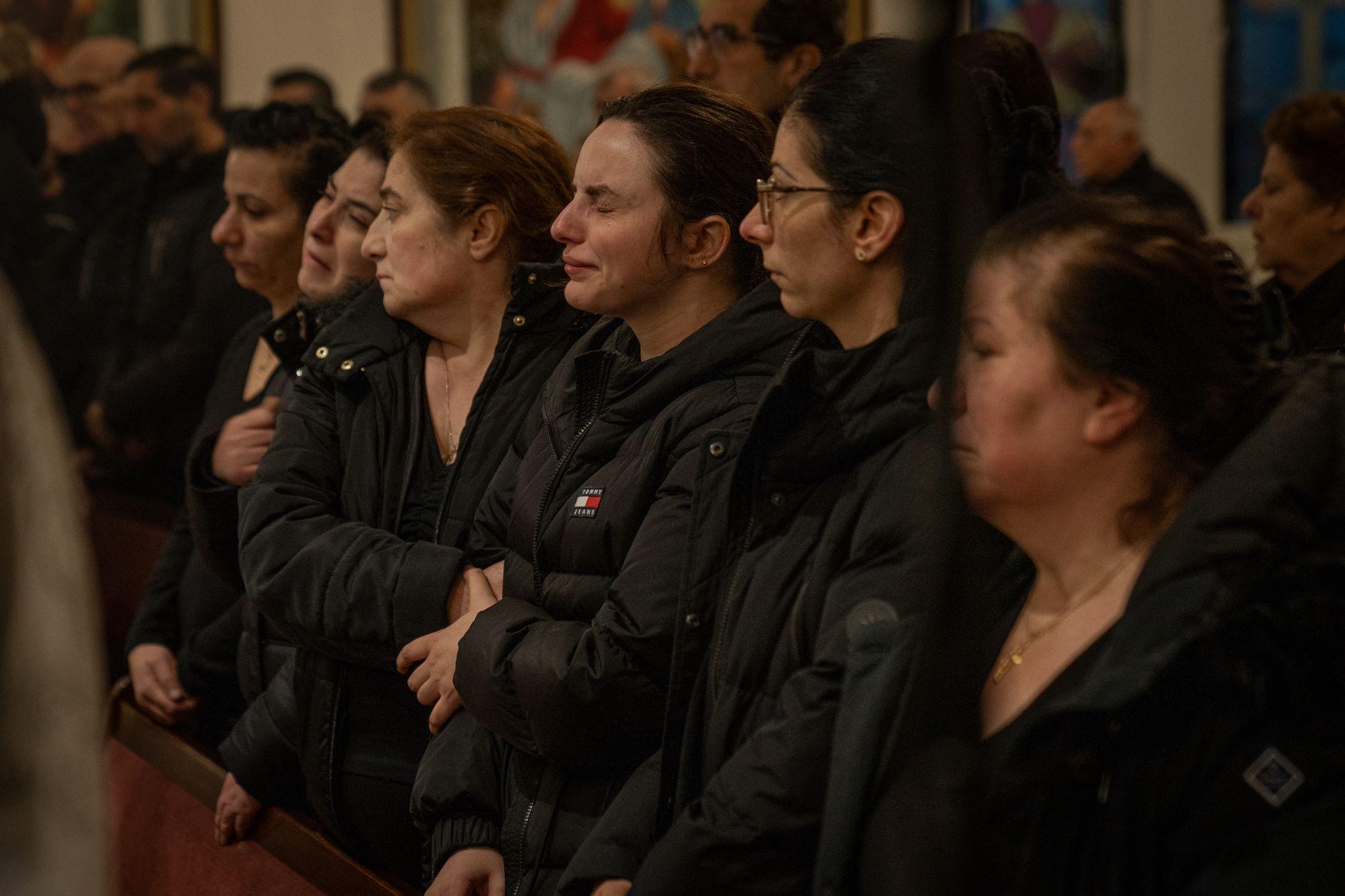 Salim Iskef's fiancee Kareen Elia, centre, at a memorial service for him in Orebro on Thursday.