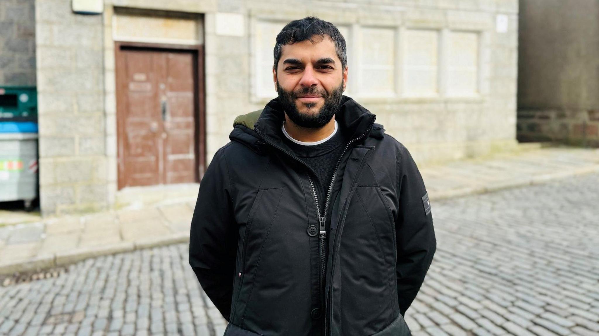 Man - Naveed Mohammed, chairman of the Aberdeen Mosque and Islamic Centre - outside the mosque.