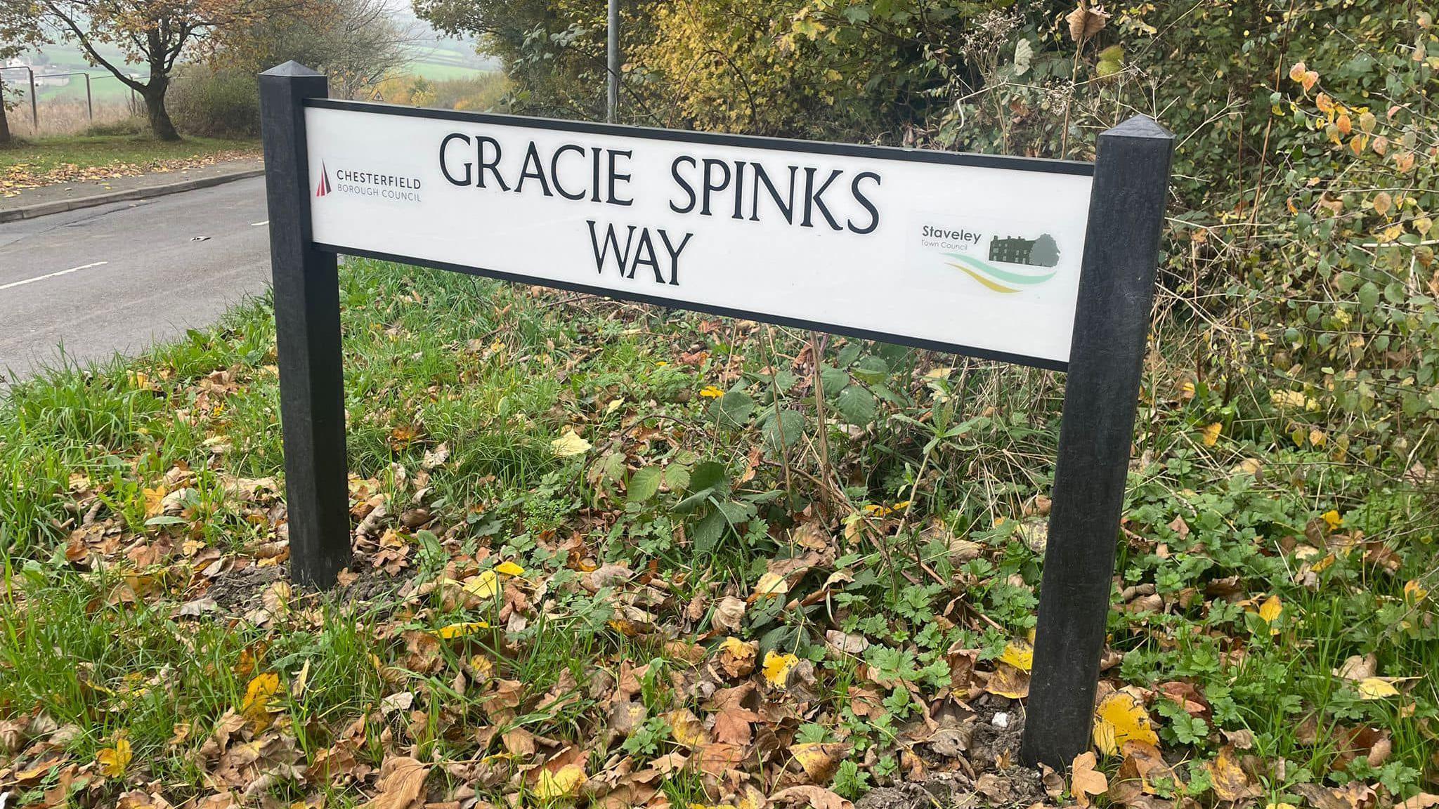 A sign that says Gracie Spinks Way