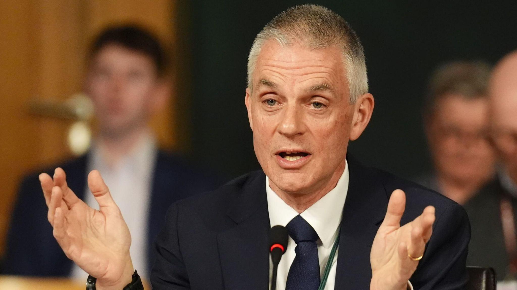 Tim Davie in a suit and tie