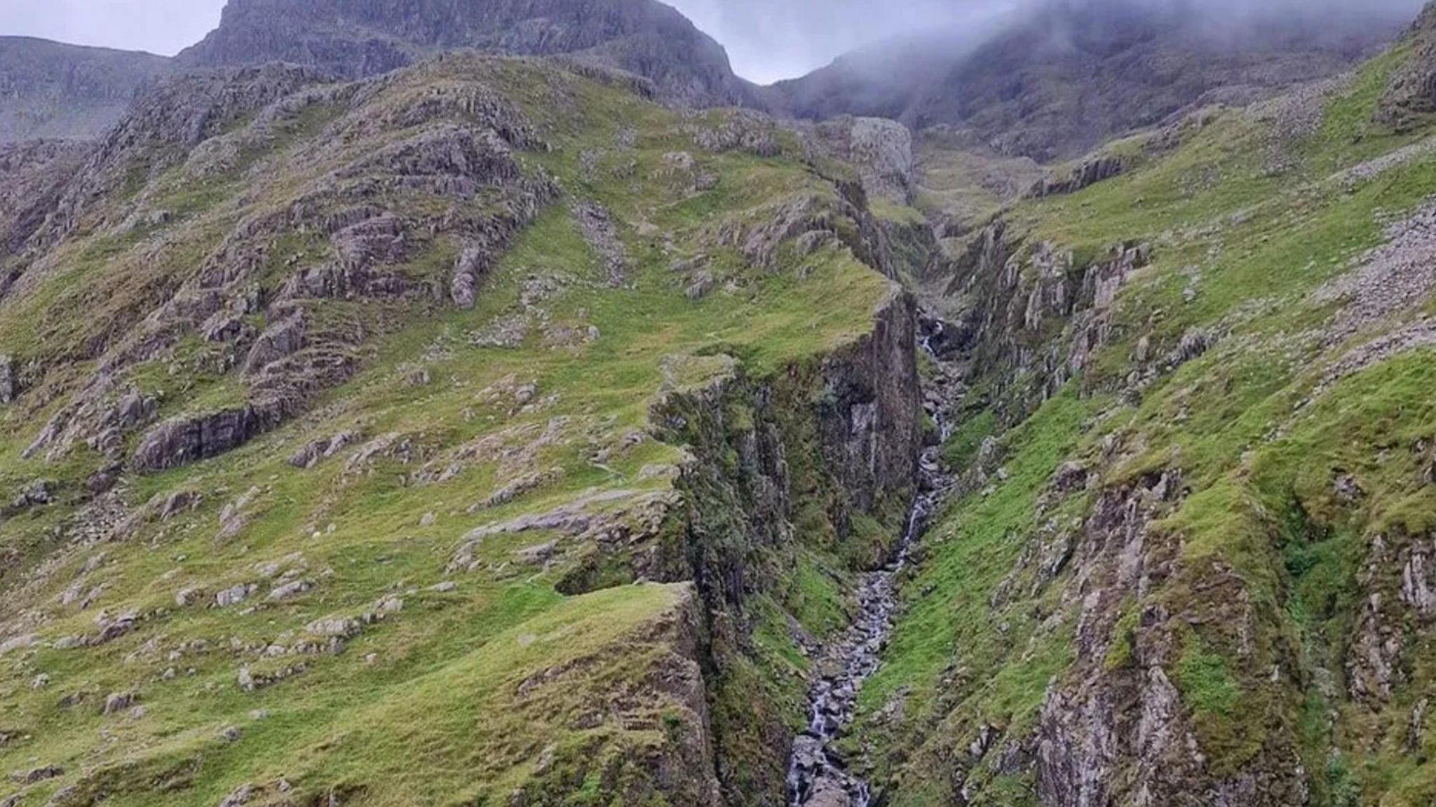 The view of Piers Gill with Scafell Pike in the background