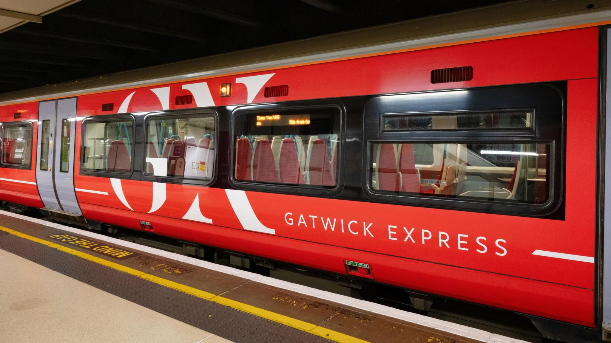 A stock photo of a red Gatwick Express train