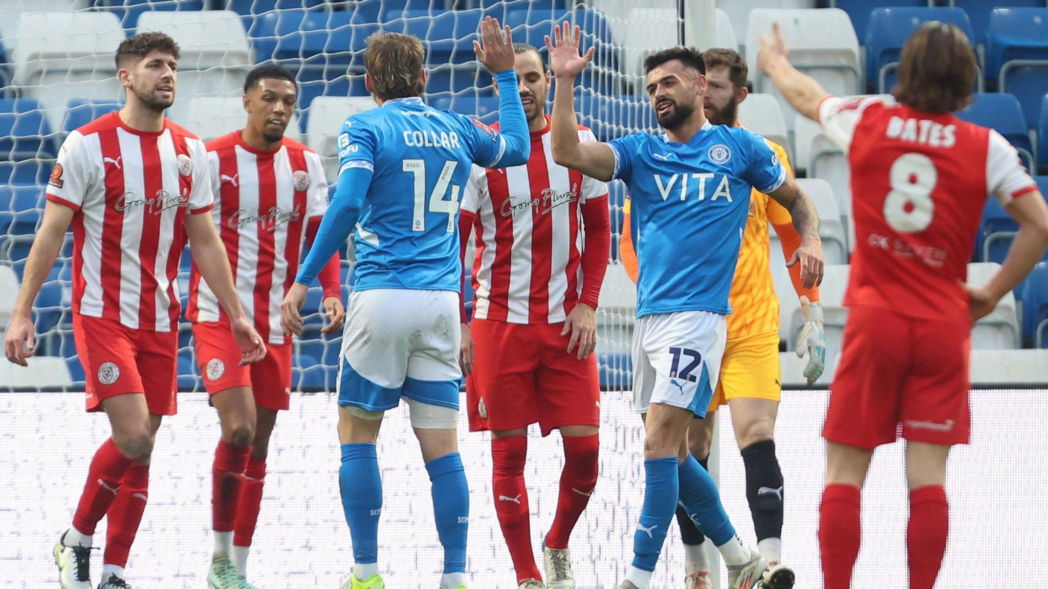 Will Collar is congratulated after scoring for Stockport against Brackley. 