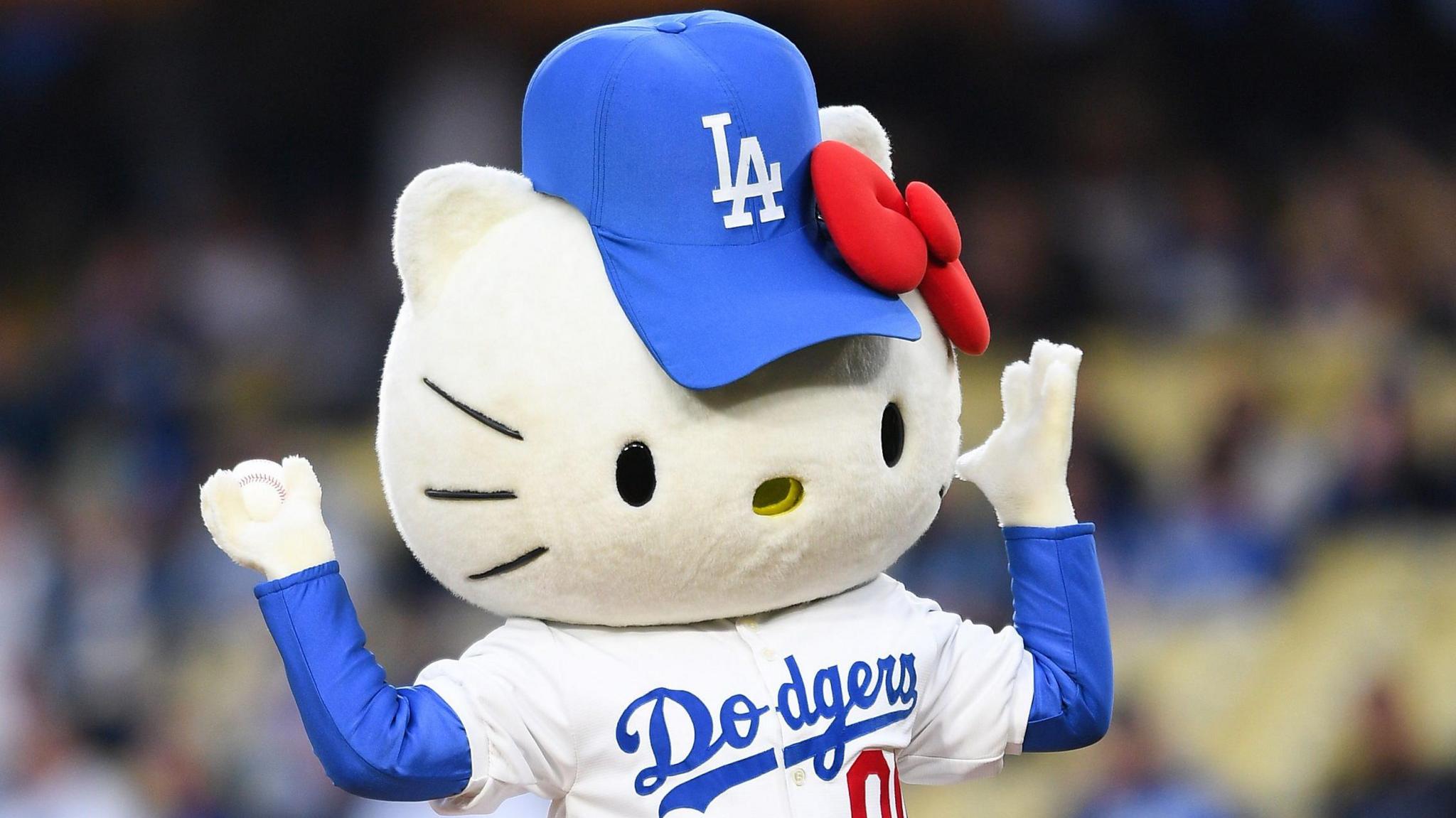 Hello Kitty throws out the first pitch before the MLB game between the New York Mets and the Los Angeles Dodgers.