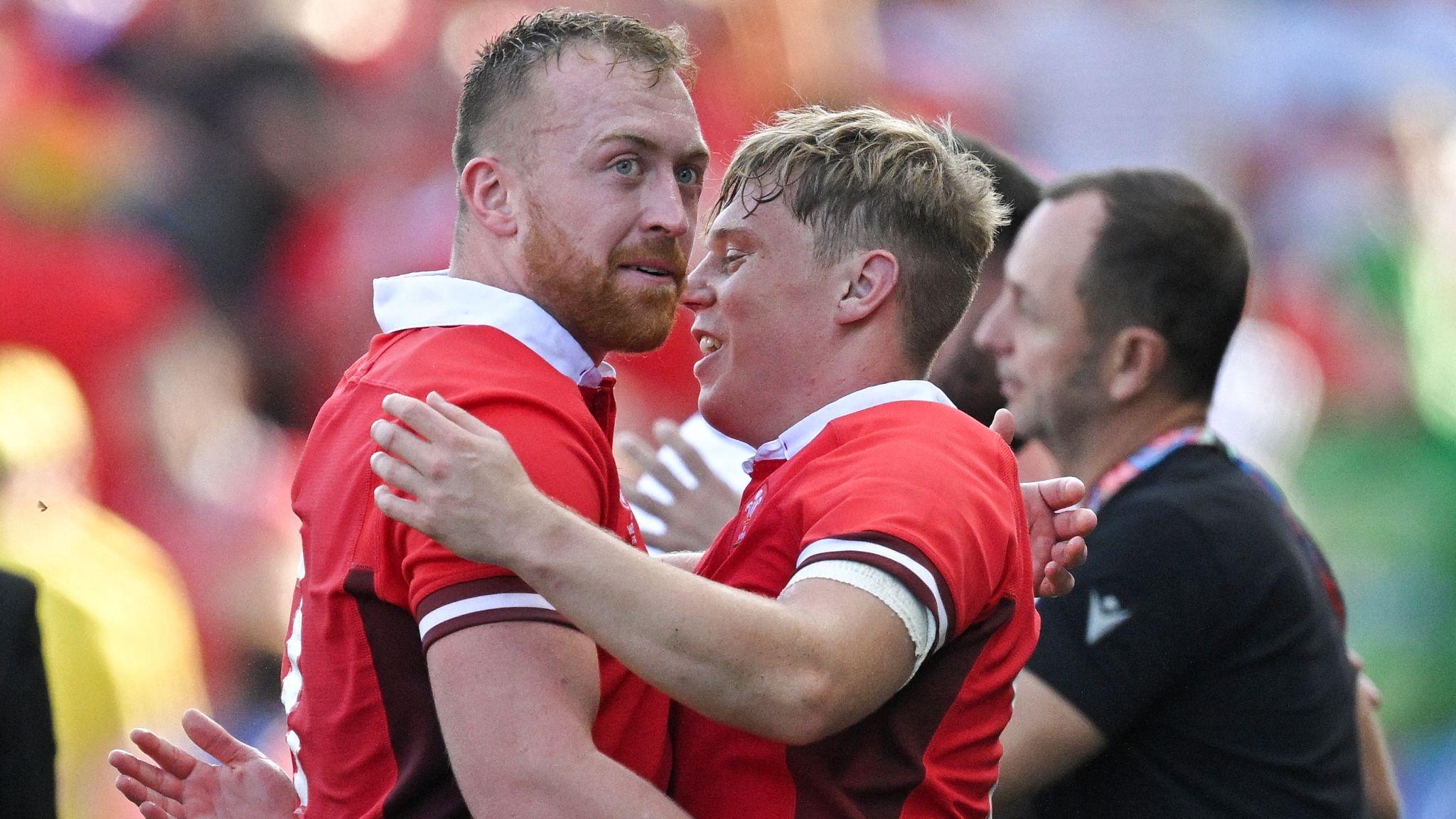 Tommy Reffell and Sam Costelow celebrate after beating Georgia at the 2023 World Cup