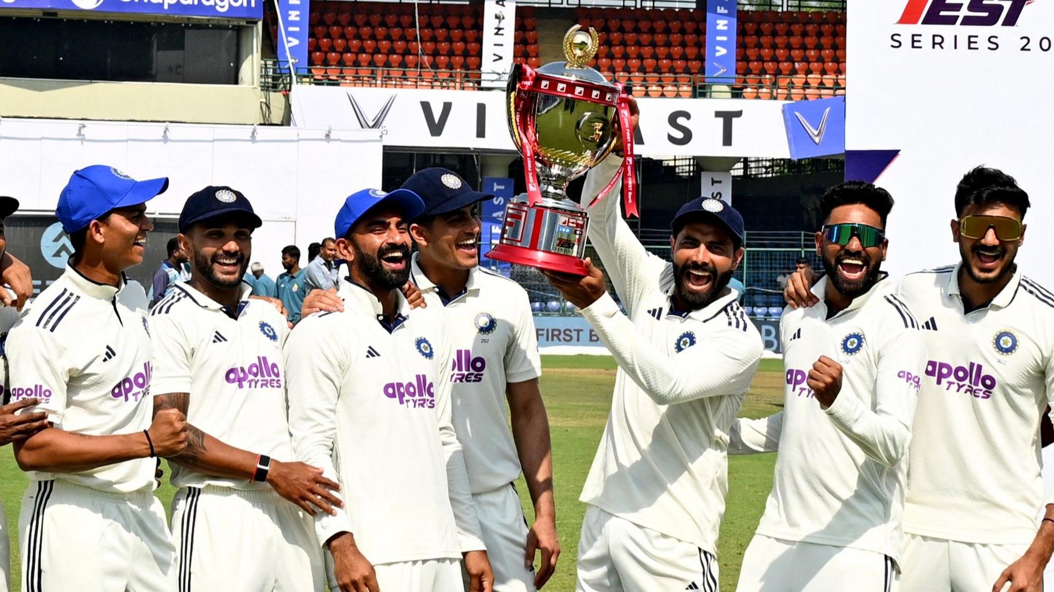 India players celebrate with the trophy