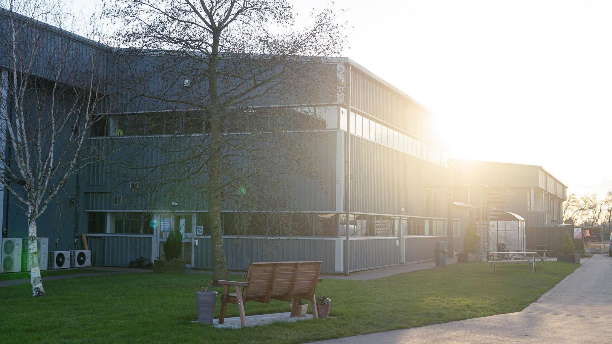 Building with sunset in background