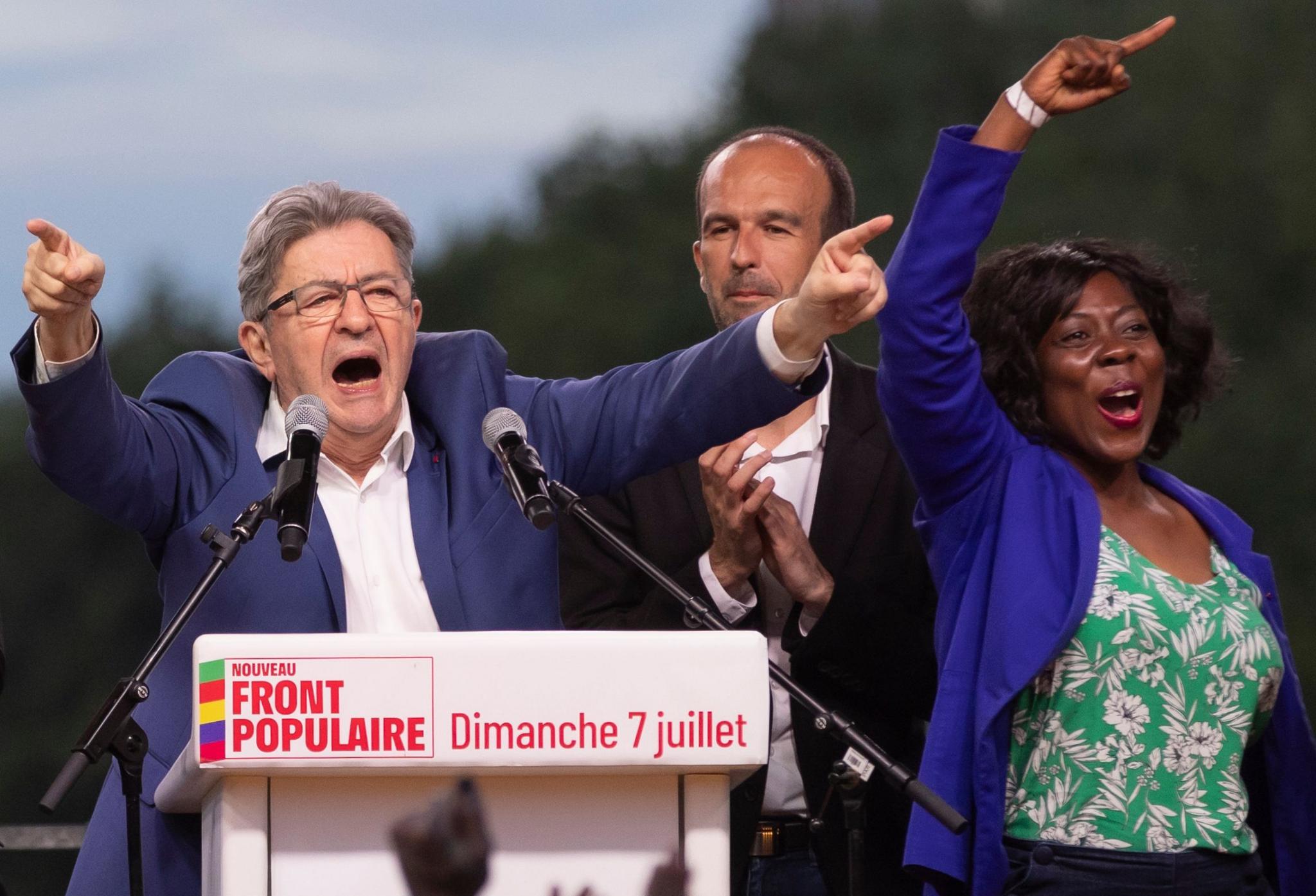 Leader of La France Insoumise (LFI) Jean-Luc Melenchon, LFI President Manuel Bompard and newly re-elected LFI Deputy Daniele Obono react during a speech after the announcement of the results of the second round of the elections in Paris, France