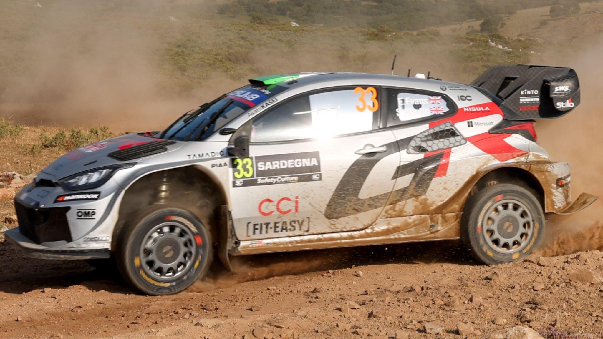 Elfyn Evans' Toyota Yaris driving on rocky gravel surface