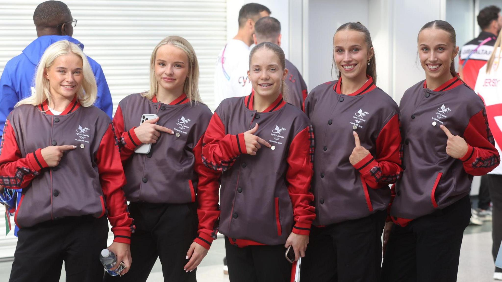 Welsh gymnastics women's team wear the official Team Wales kit at the Commonwealth Games opening ceremony