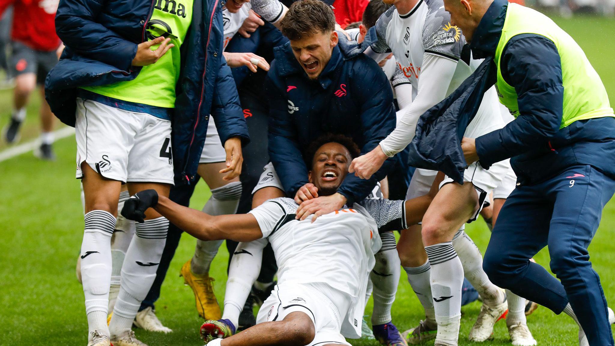 Jamal Lowe celebrates scoring against Cardiff in March