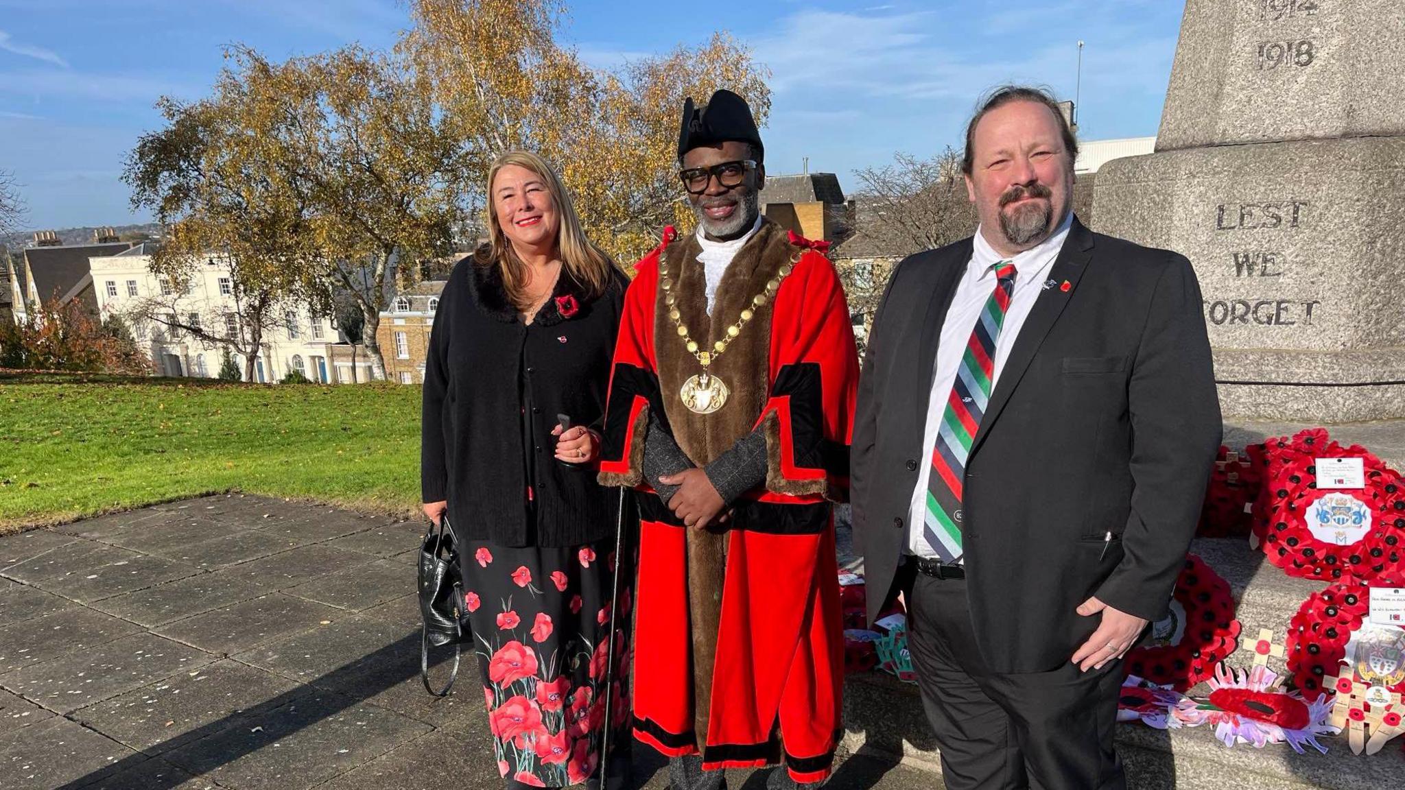 Medway councillor Joanne Howcroft-Scott, deputy mayor of Medway councillor Douglas Hamandishe and Medway Council leader Vince Maple at Victoria Gardens war memorial in Rochester.