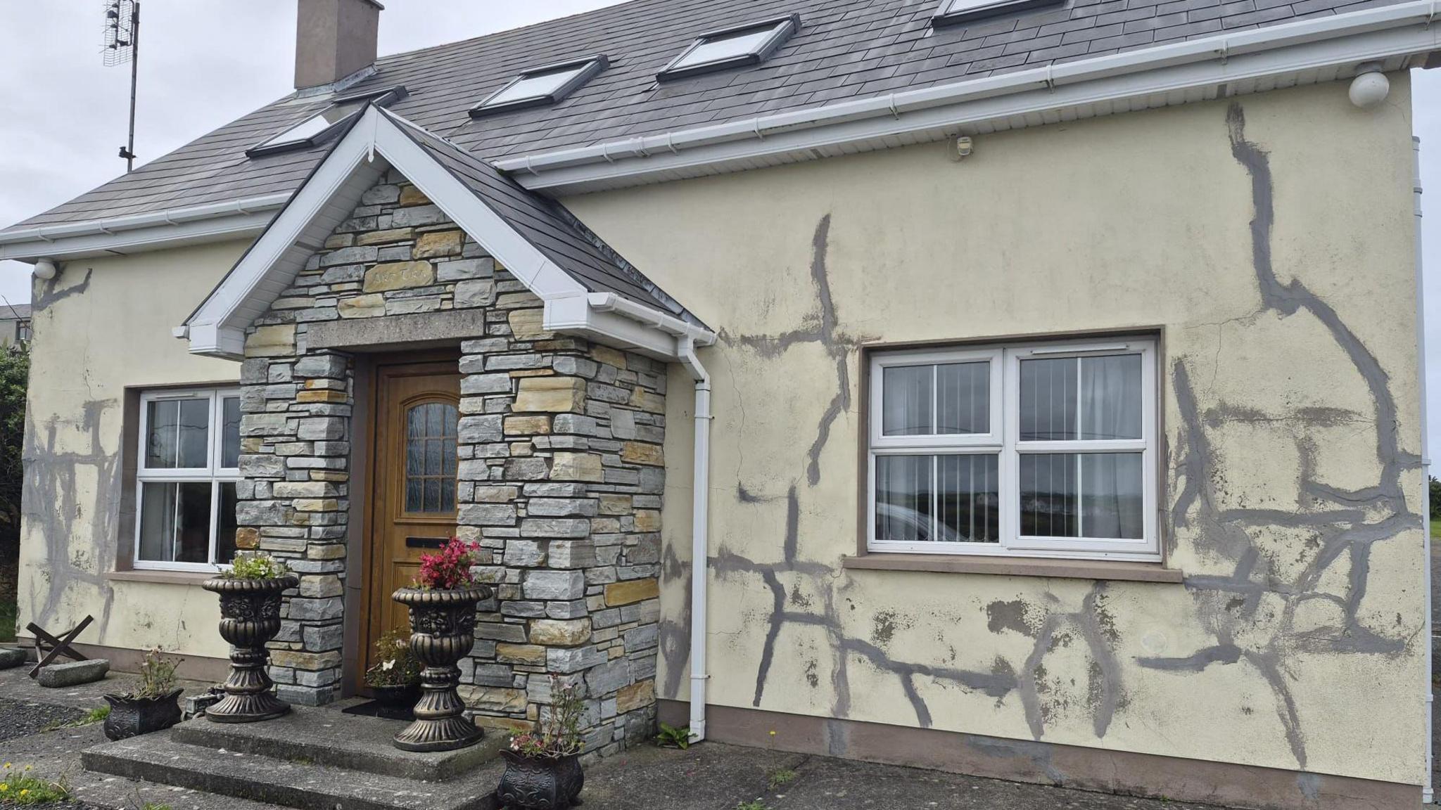 A house with large structural cracks 