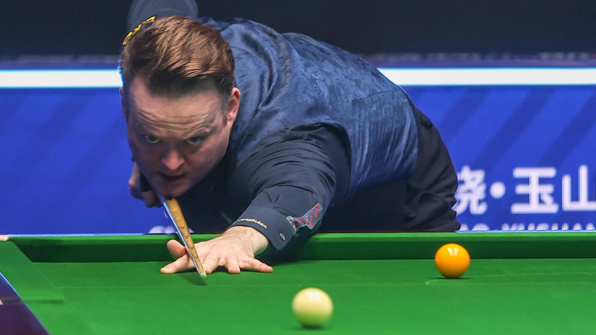 Shaun Murphy playing a shot at the World Open