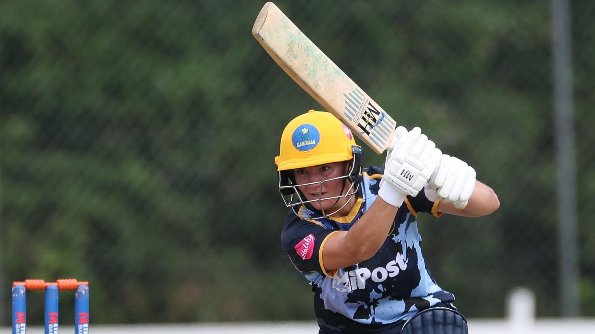 Daisy Mullan plays a shot