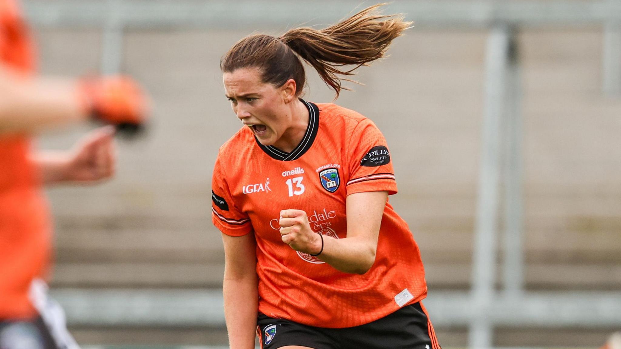 Aimee Mackin celebrates scoring a goal
