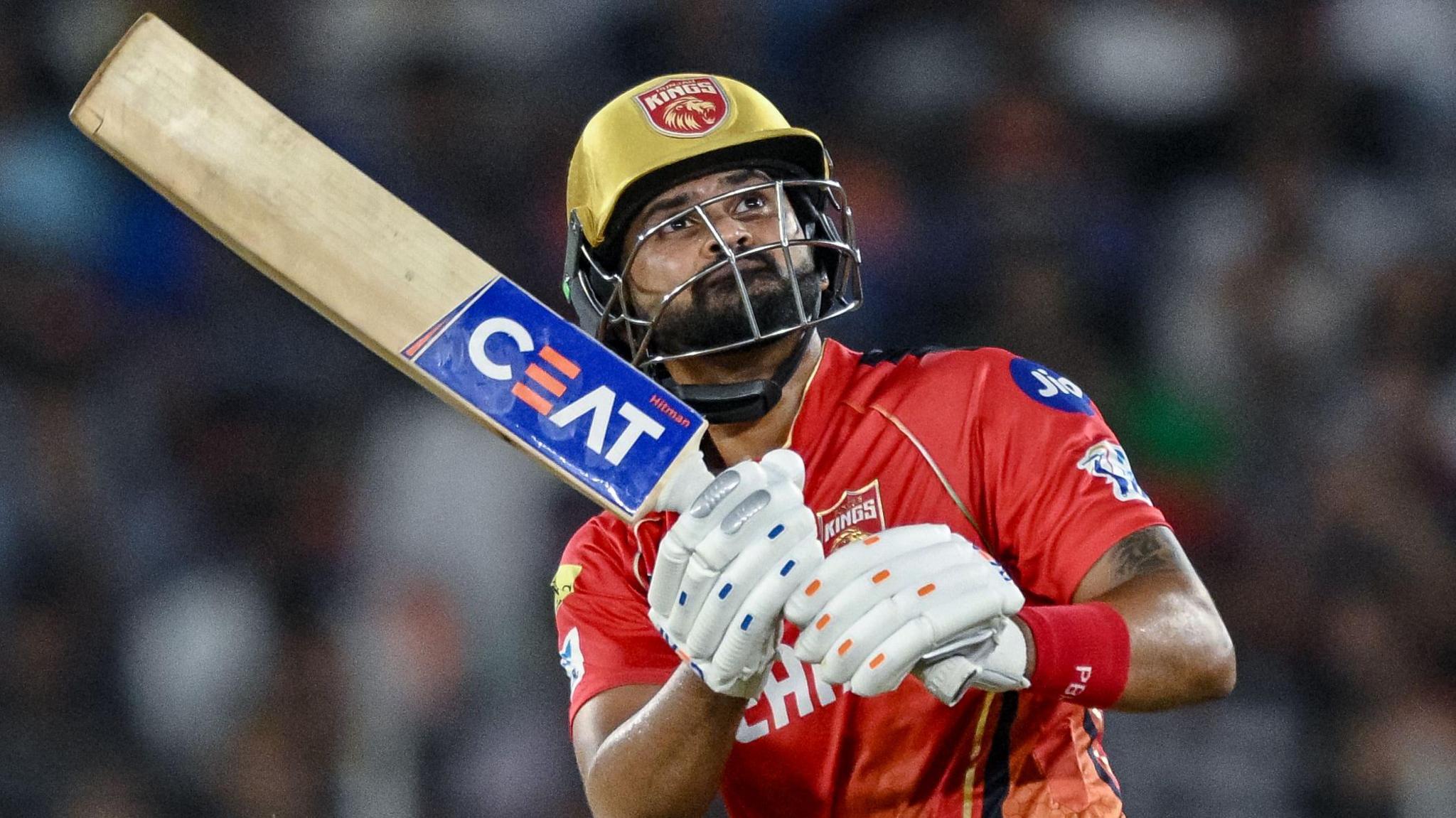 Punjab Kings batter Shreyas Iyer watches the ball after playing a shot in an IPL match against Mumbai Indians