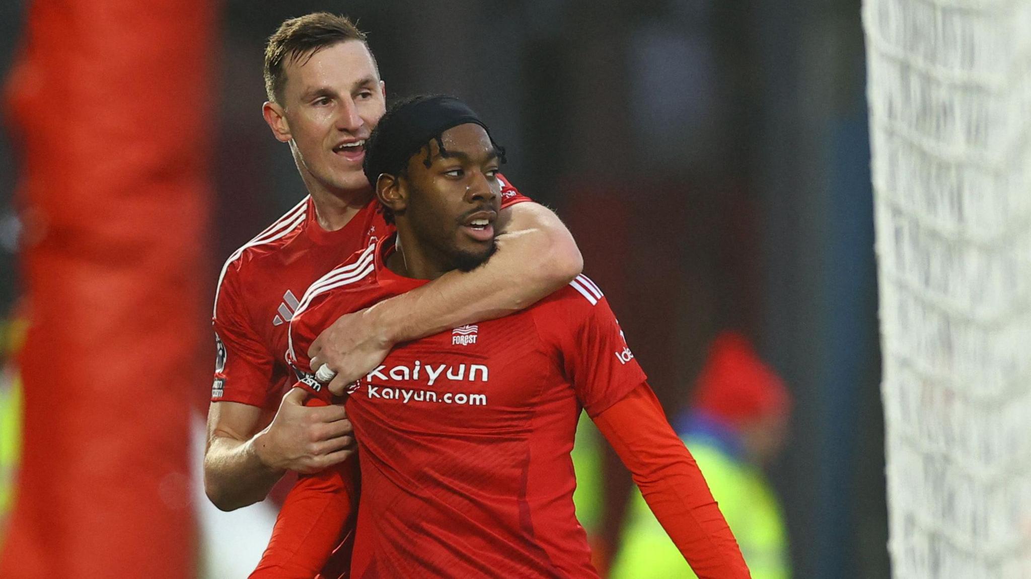 Anthony Elanga and Chris Wood celebrate