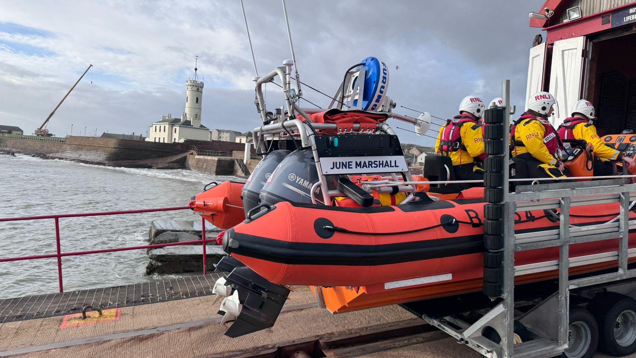 A close-up of the side of a new lifeboat with its name - June Marshall - clearly visible on the side