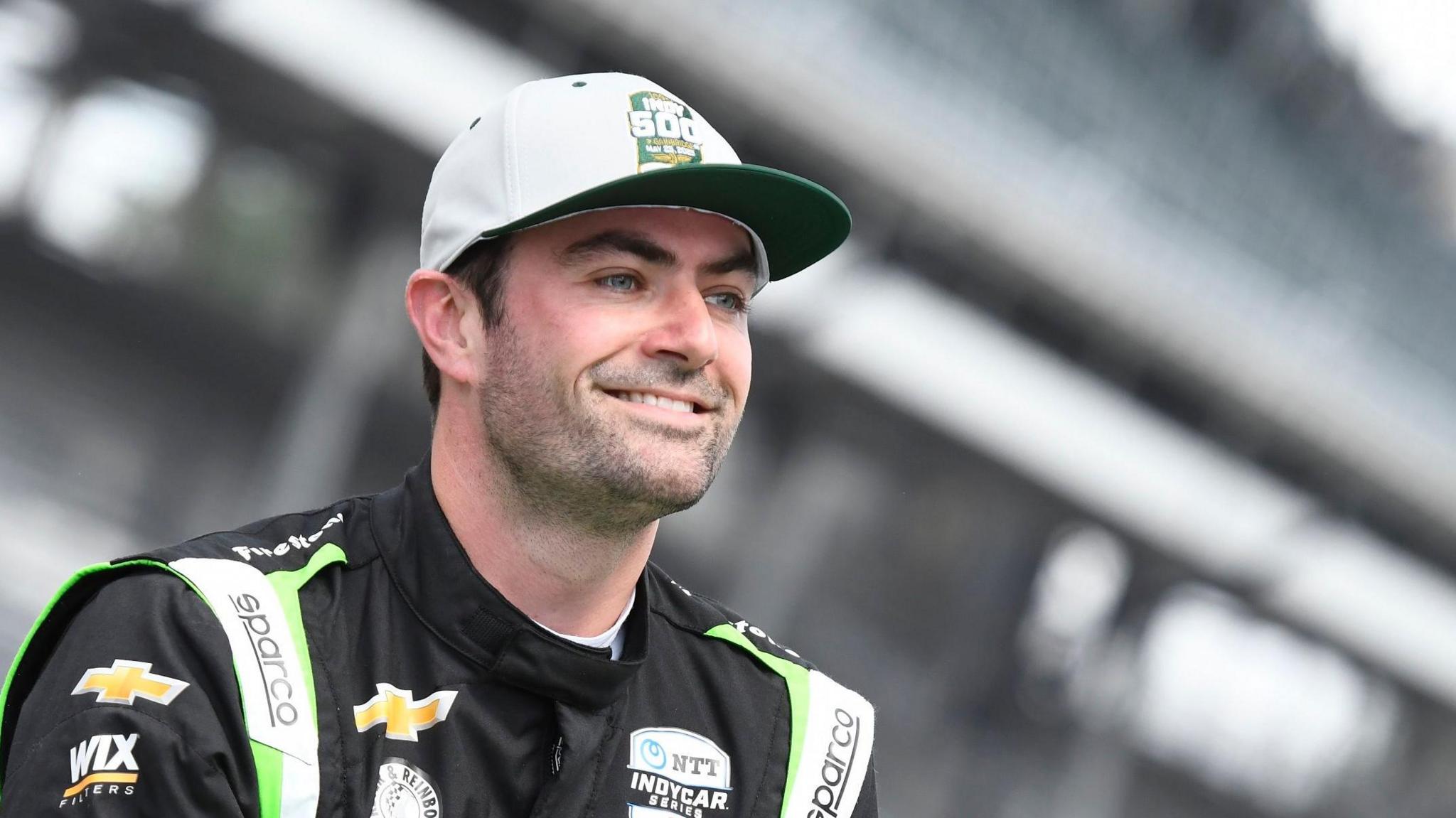 Jack Harvey poses for a picture on the Indycar grid