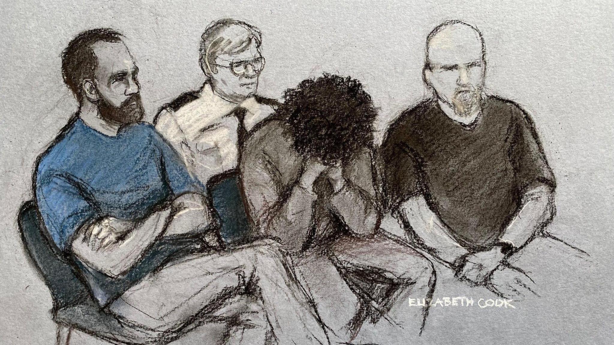 A court sketch of Axel Muganwa Rudakubana wearing a grey sweatshirt and covering his face, surrounding by court officials sitting down