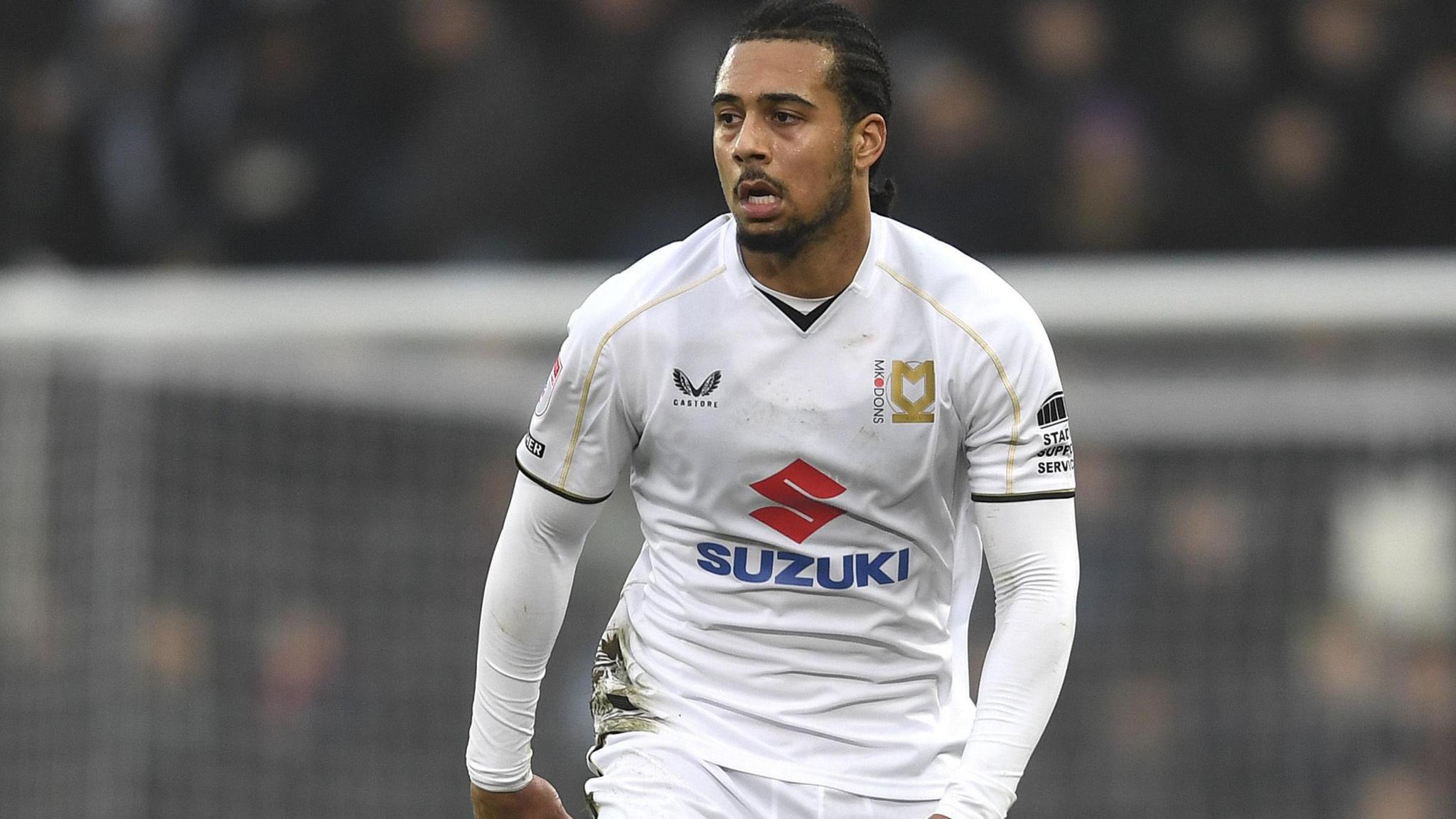 Nico Lawrence in action for MK Dons in 2024-25