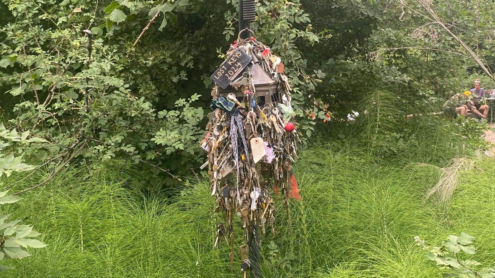 A tree made of keys that were left behind at the 2024 Glastonbury festival