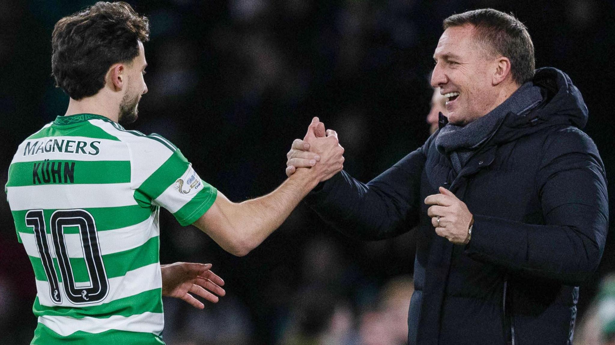 Celtic winger Nicolas Kuhn with manager Brendan Rodgers