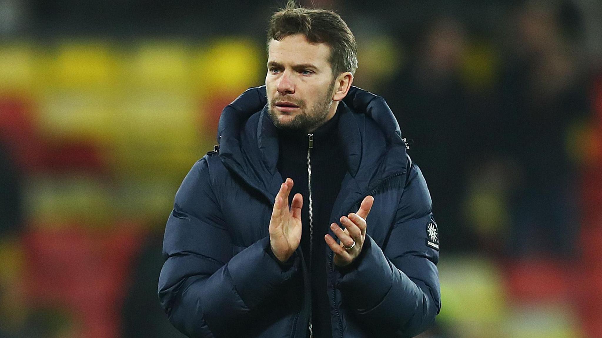 Watford boss Tom Cleverley clapping supporters at Vicarage Road