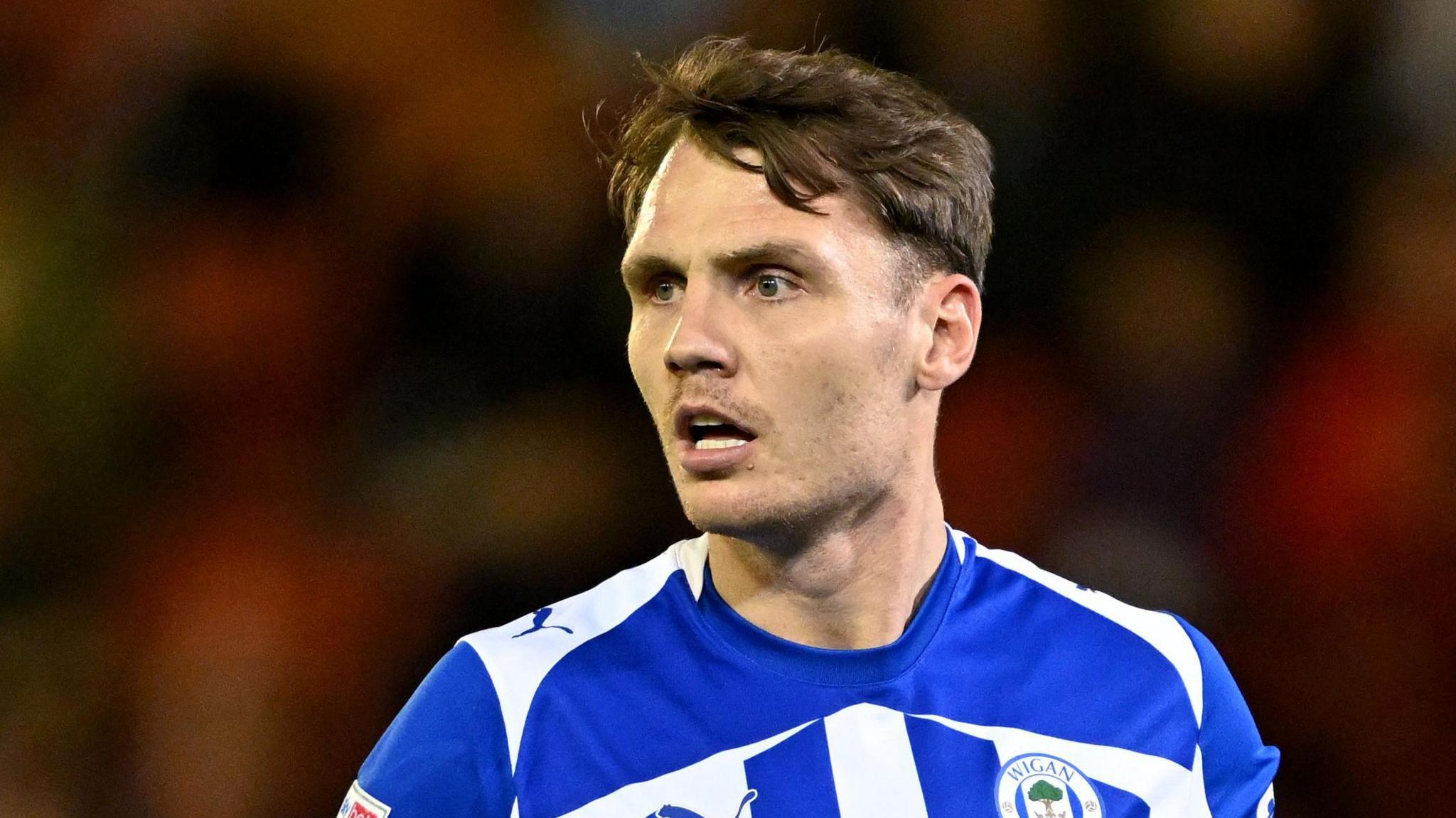 Jason Kerr in action for Wigan Athletic this season