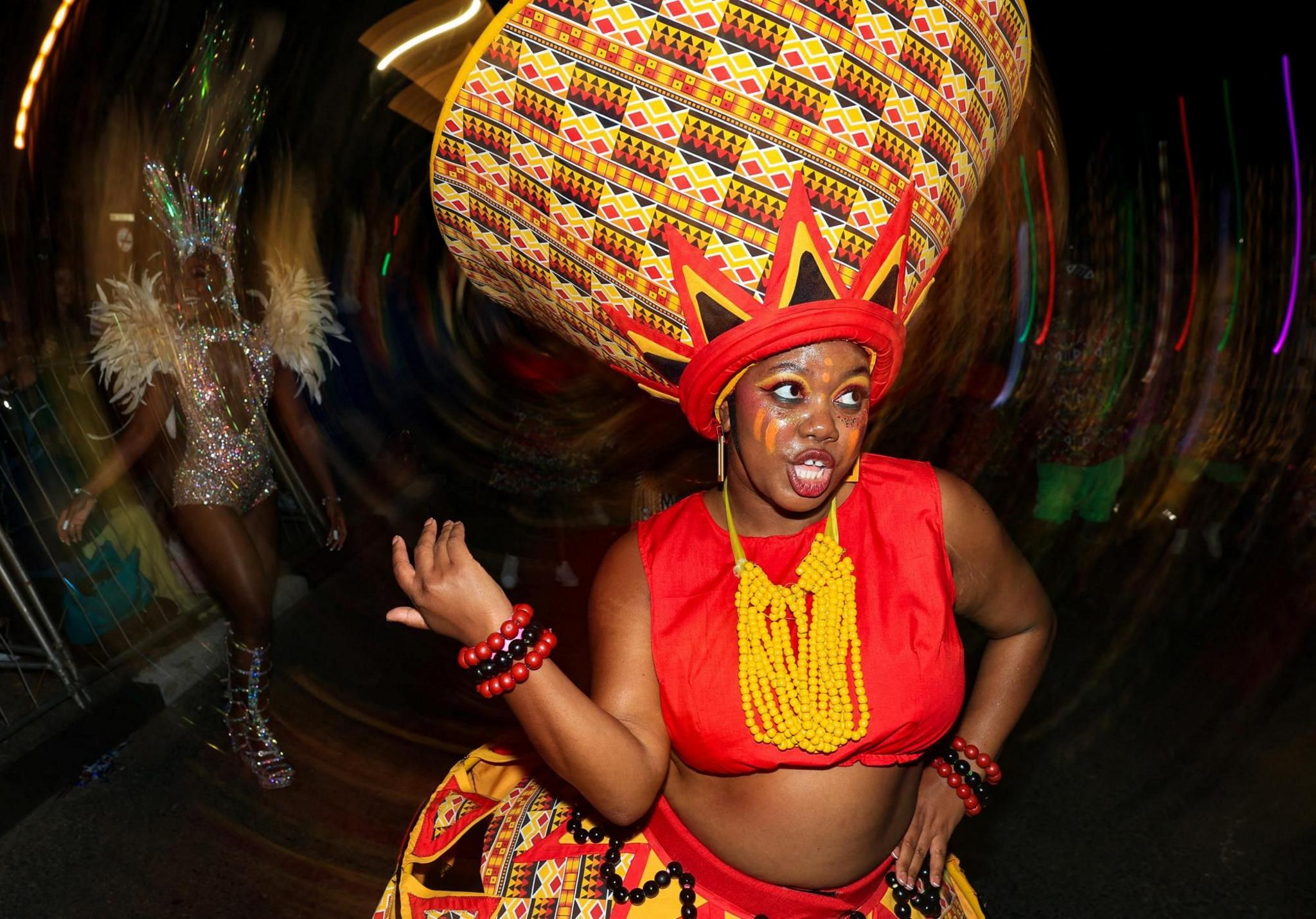 A reveller takes part in the annual Cape Town Carnival in Green Point, Cape Town, South Africa, March 15, 2025. 
