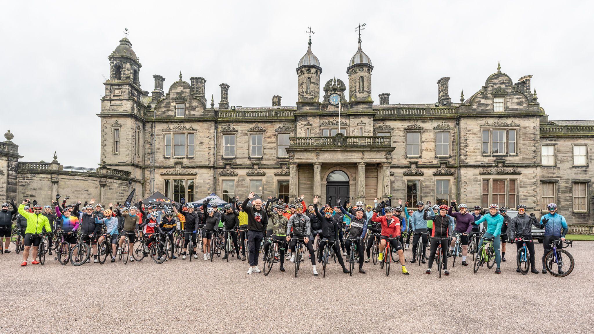 Sir Bradley Wiggins with dozens of cyclists at Sandon Hall in Stafford