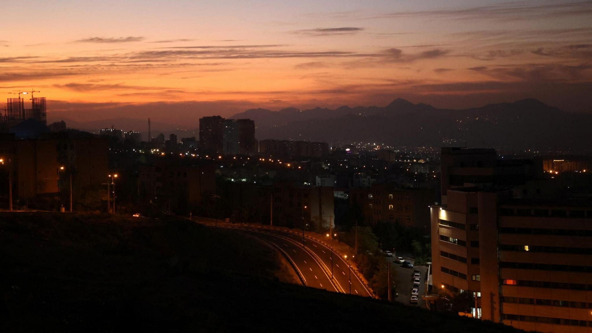 Tehran at sunrise on Saturday morning, following Israeli strikes on sites around the Iranian capital