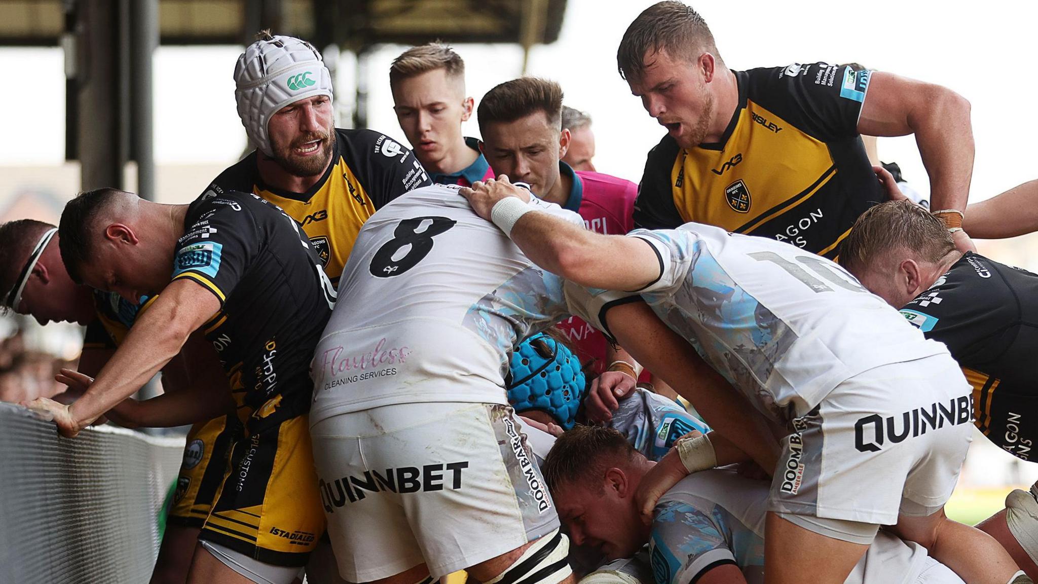 Dragons and Ospreys players square up in the United Rugby Championship (URC) derby