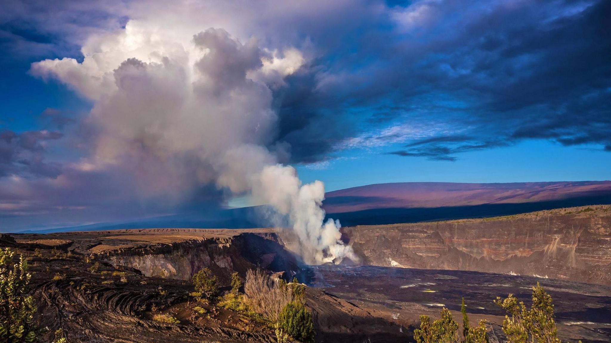 Gas is seen rising from the volcano's crater.