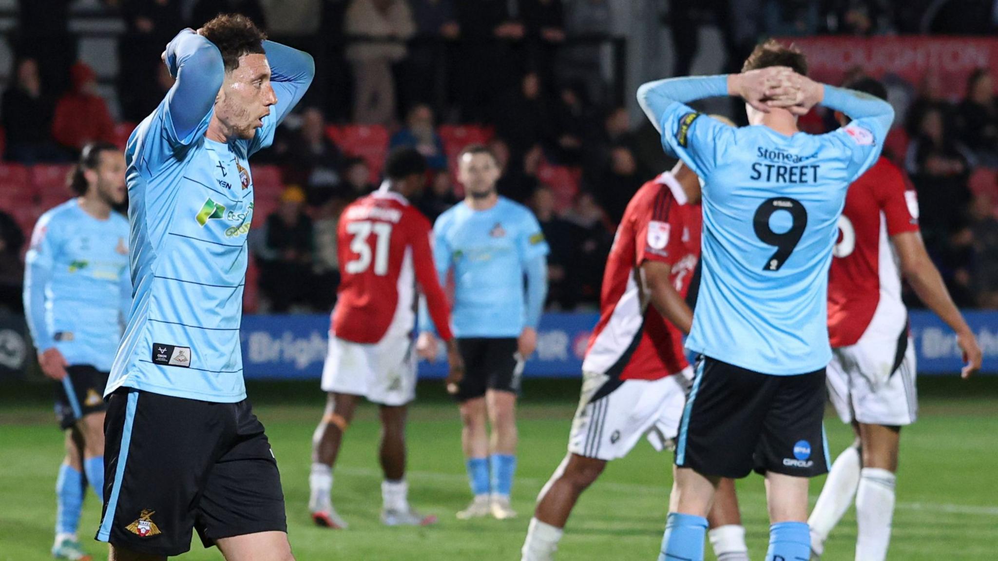 Jordan Gibson, of Doncaster Rovers, looks dejected after missing a chance against Salford City