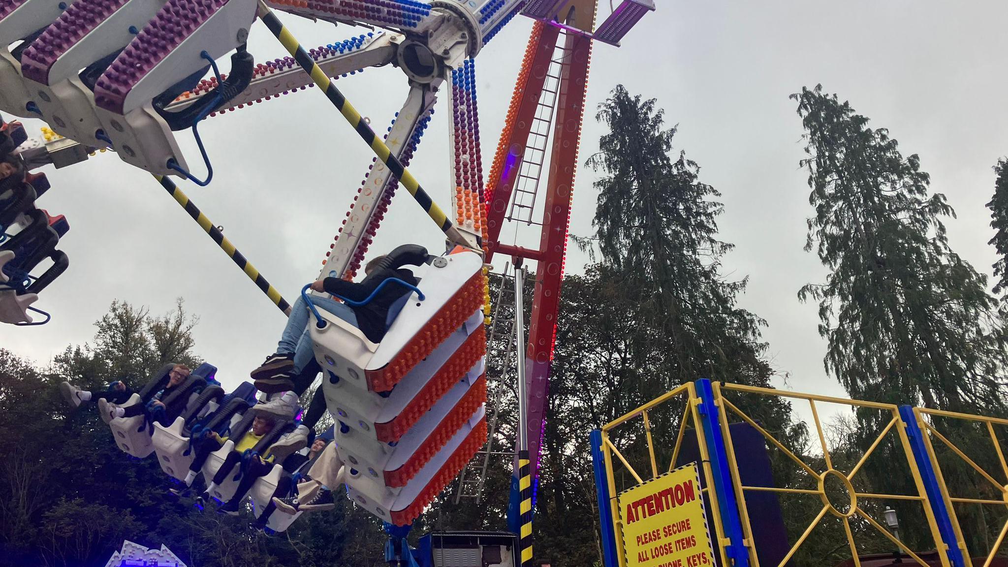 People on a ride at Tavistock Goose Fair