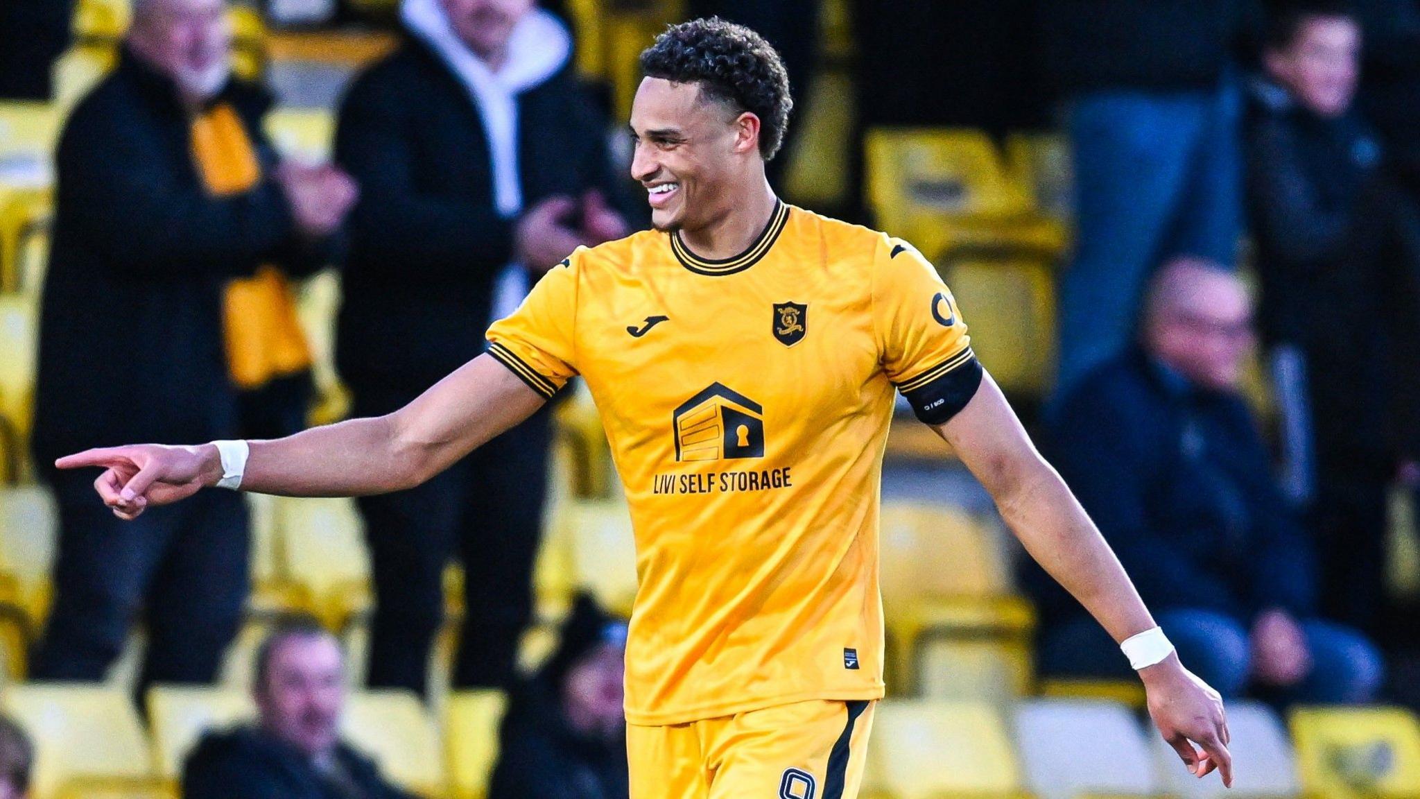 Tete Yengi celebrates after scoring for Livingston against Falkirk