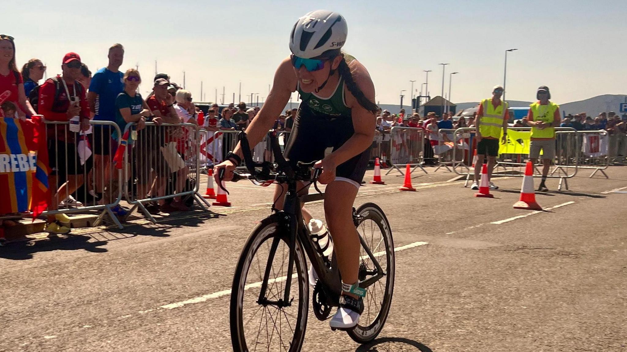 Hannah Kennedy cycling in 2025 Island Games triathlon