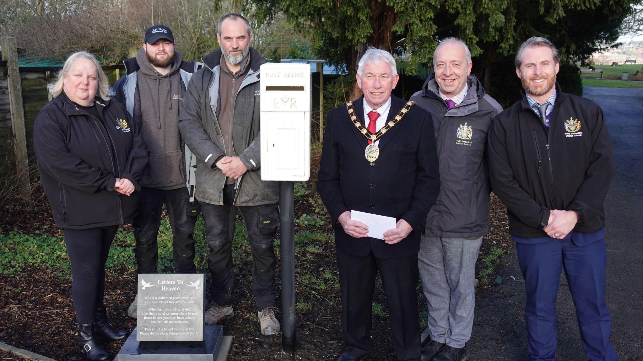 Councillor Sean Bambrick with staff from South Derbyshire District Council and representatives from Art Stone Memorials Ltd