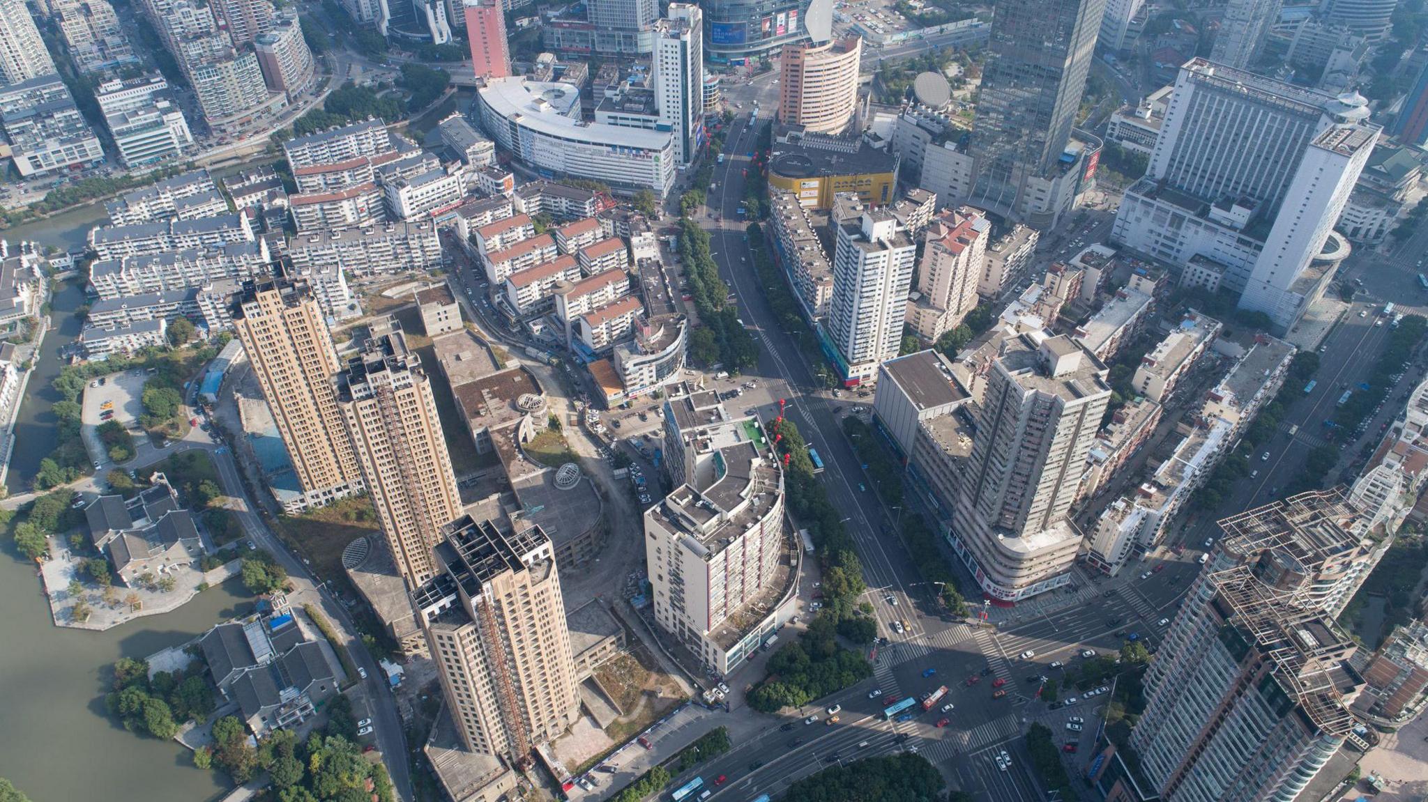 Aerial picture of Wuxi. It shows roads and several high-rise buildings