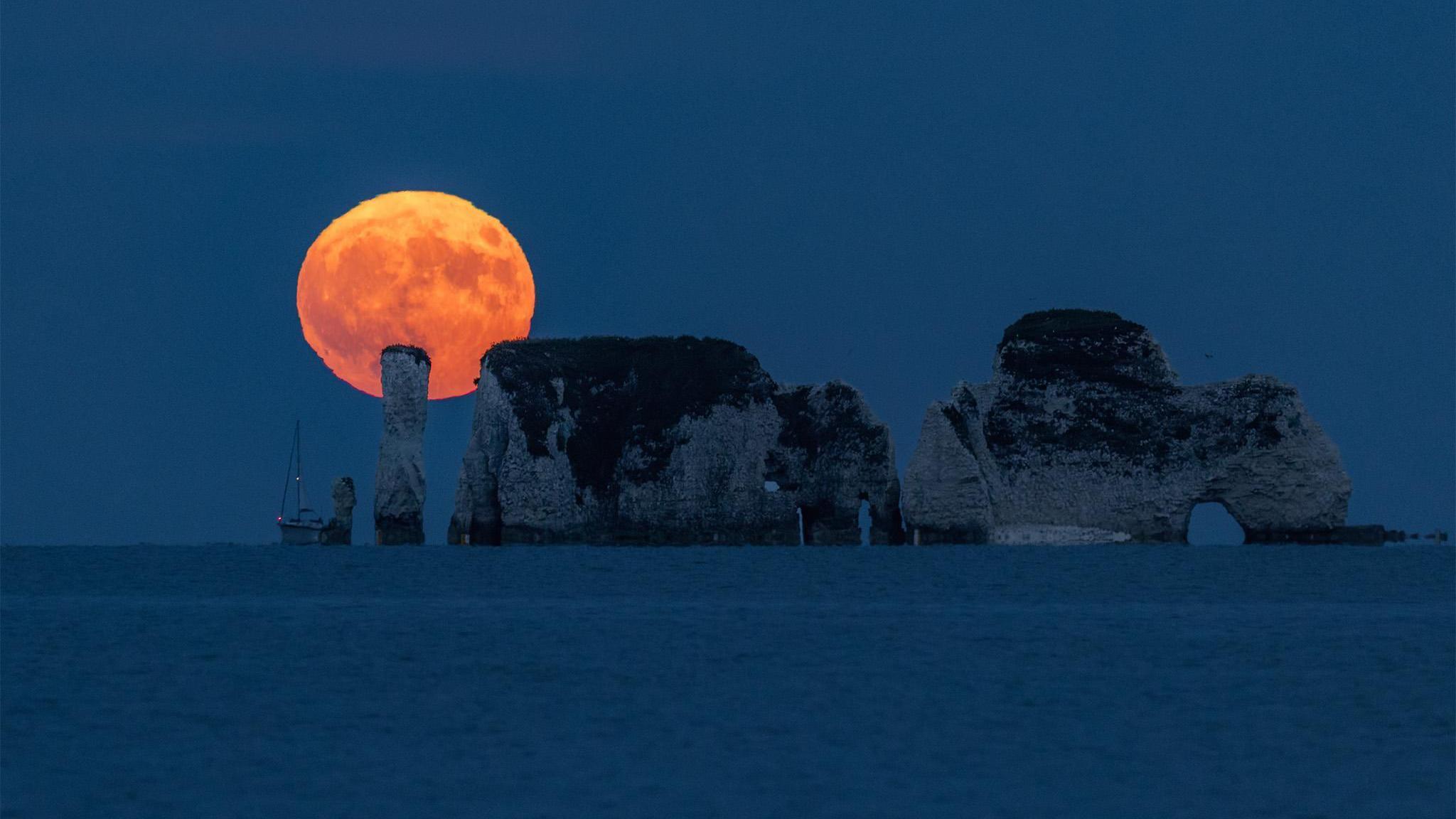 Strawberry Moon rising - taken from Swanage, Dorset