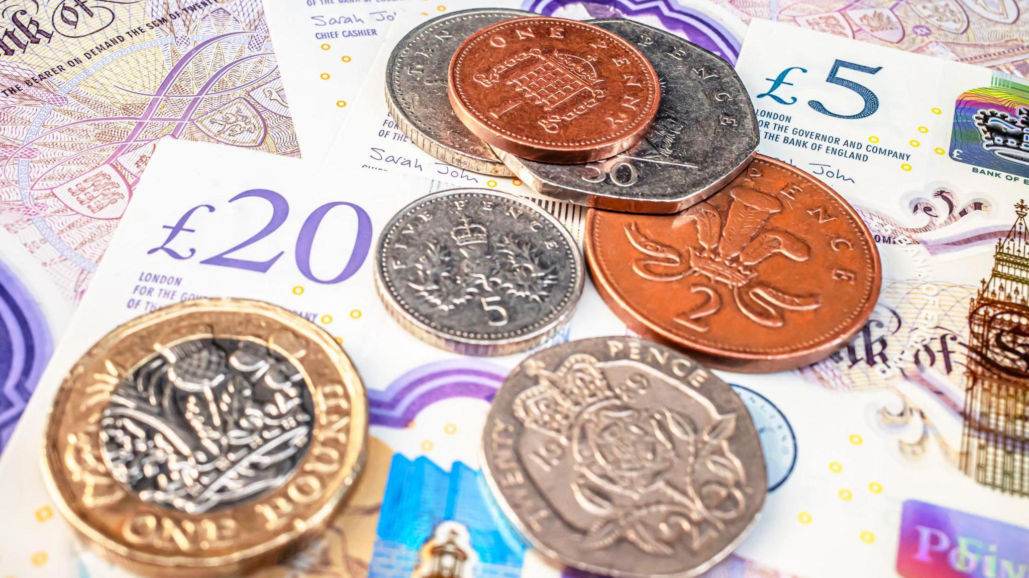 Various English coins and banknotes (stock photo)