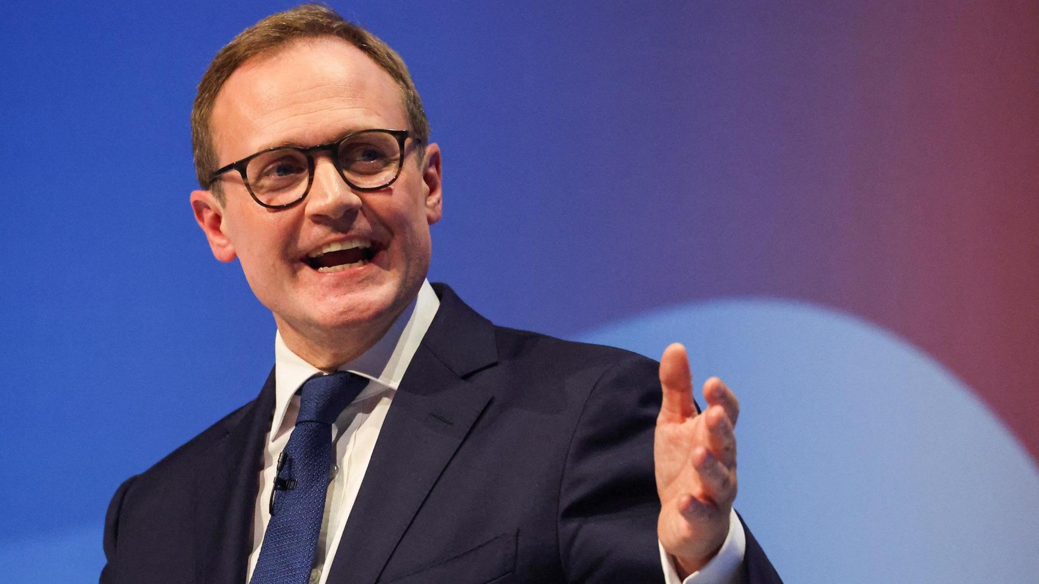 Tom Tugendhat speaking from the main stage at the Conservative Party Conference in Birmingham 