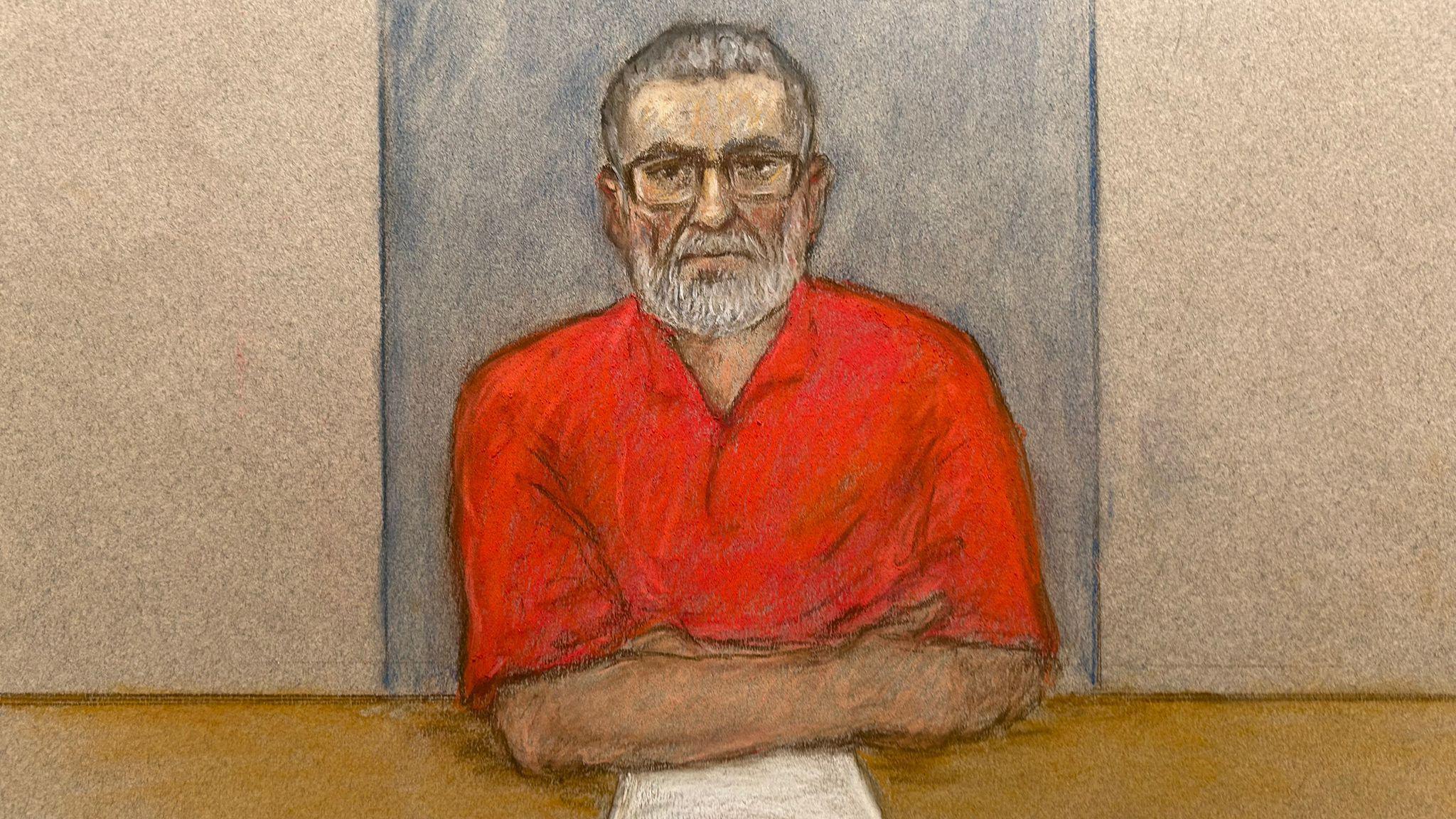 A court sketch of Peter Sullivan appearing before the Court of Appeal, via video link from HMP Wakefield. He is wearing glasses and an orange T-shirt. He has his arms folded and is starring directly at the camera.