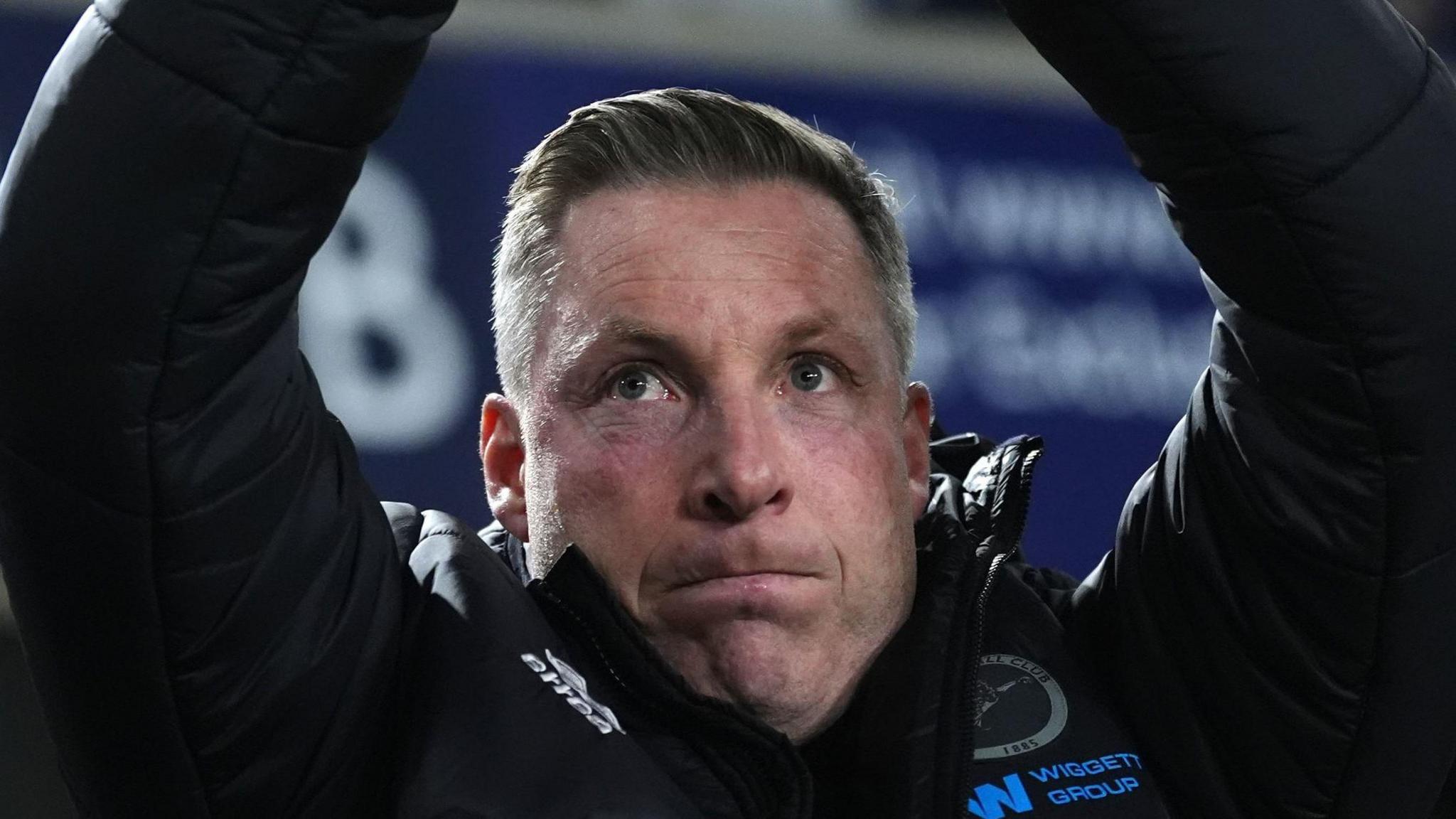 Neil Harris applauds the Millwall fans at The Den