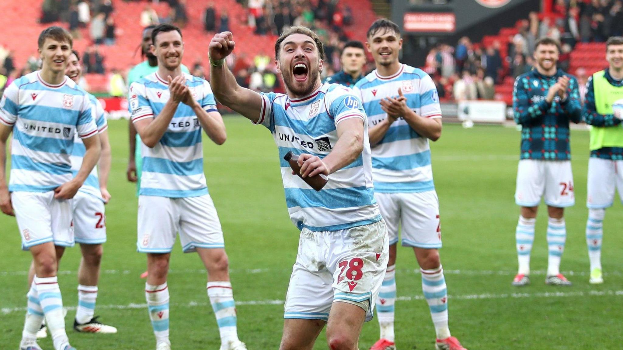 Wrexham striker Sam Smith celebrates