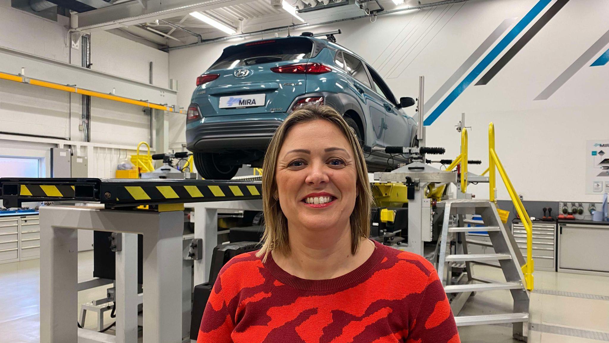 Sarah Windrum of MIRA Technology Park stood at a car testing facility