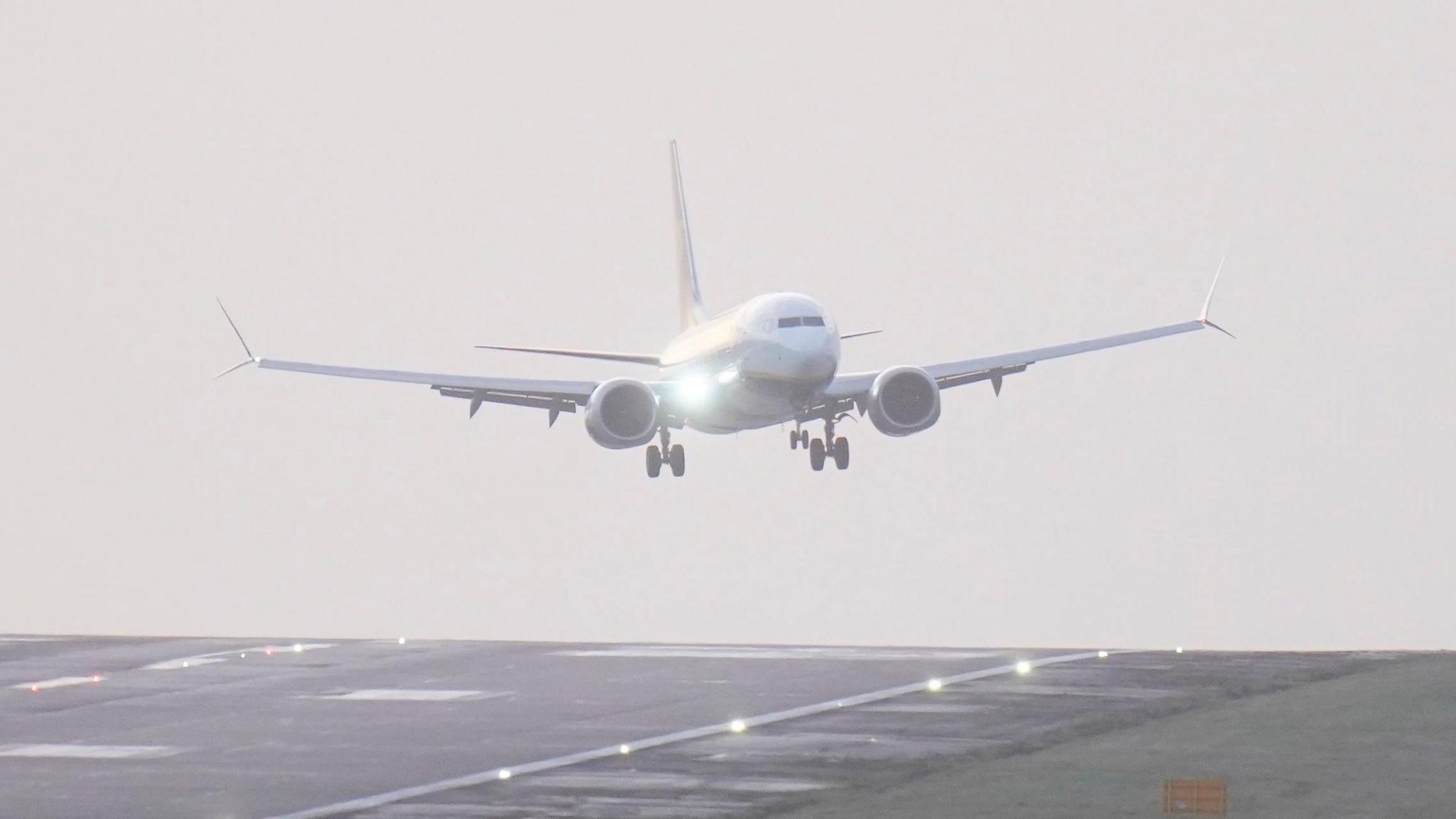 A plane landing at Leeds Bradford Airport