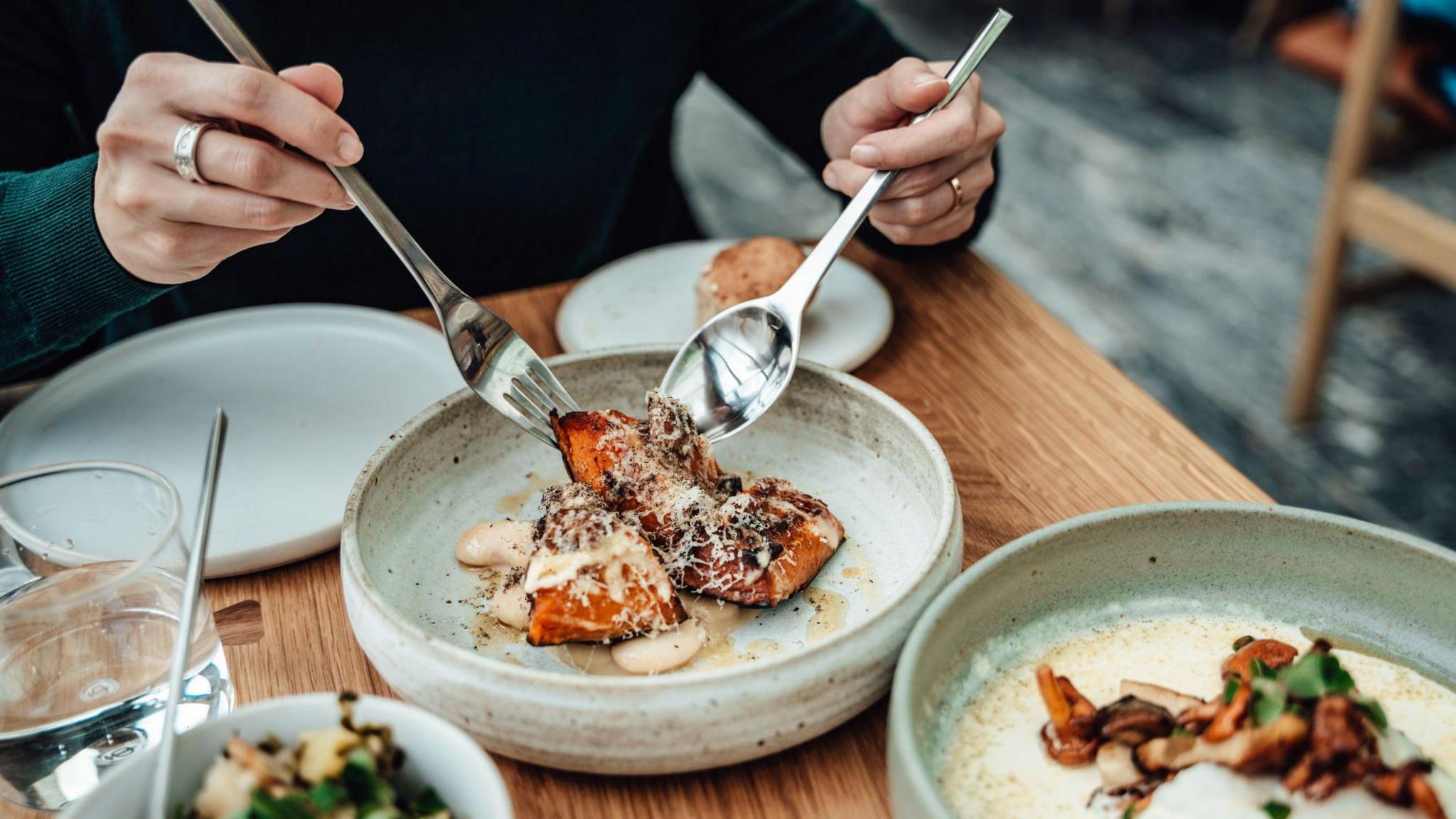 A fancy meal on a table at a restaurant